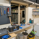 all-groups Garage workshop with tools on a Toden  workbench and pegboard
