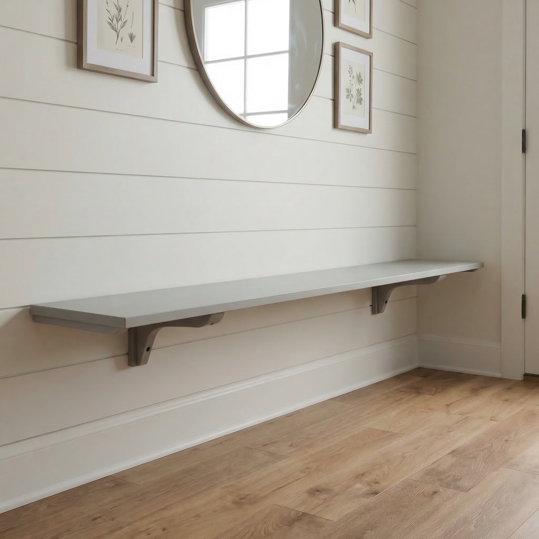 Toden gray modular surface installed as a minimalist floating entryway bench on a white shiplap wall. The 72-inch gray panel is supported by industrial-strength brackets, showcasing the sleek, low-profile design and "no diagonal support" engineering. The setup demonstrates a clean, unobstructed storage solution for a modern home mudroom or hallway.
