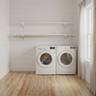 Toden white modular laundry room storage system with a double-row shelf configuration on a shiplap wall. The setup features two 72-inch white floating surfaces mounted above a white washer and dryer, with an integrated wooden closet rod for air-drying clothes. This visual highlights the sleek, no-diagonal support bracket design and the system's industrial-strength load capacity in a bright, minimalist utility space.